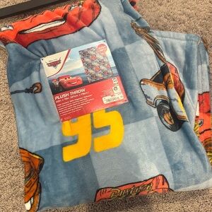 NWT Disney Pixar’s Cars lightning McQueen and tow Mater plush blanket.